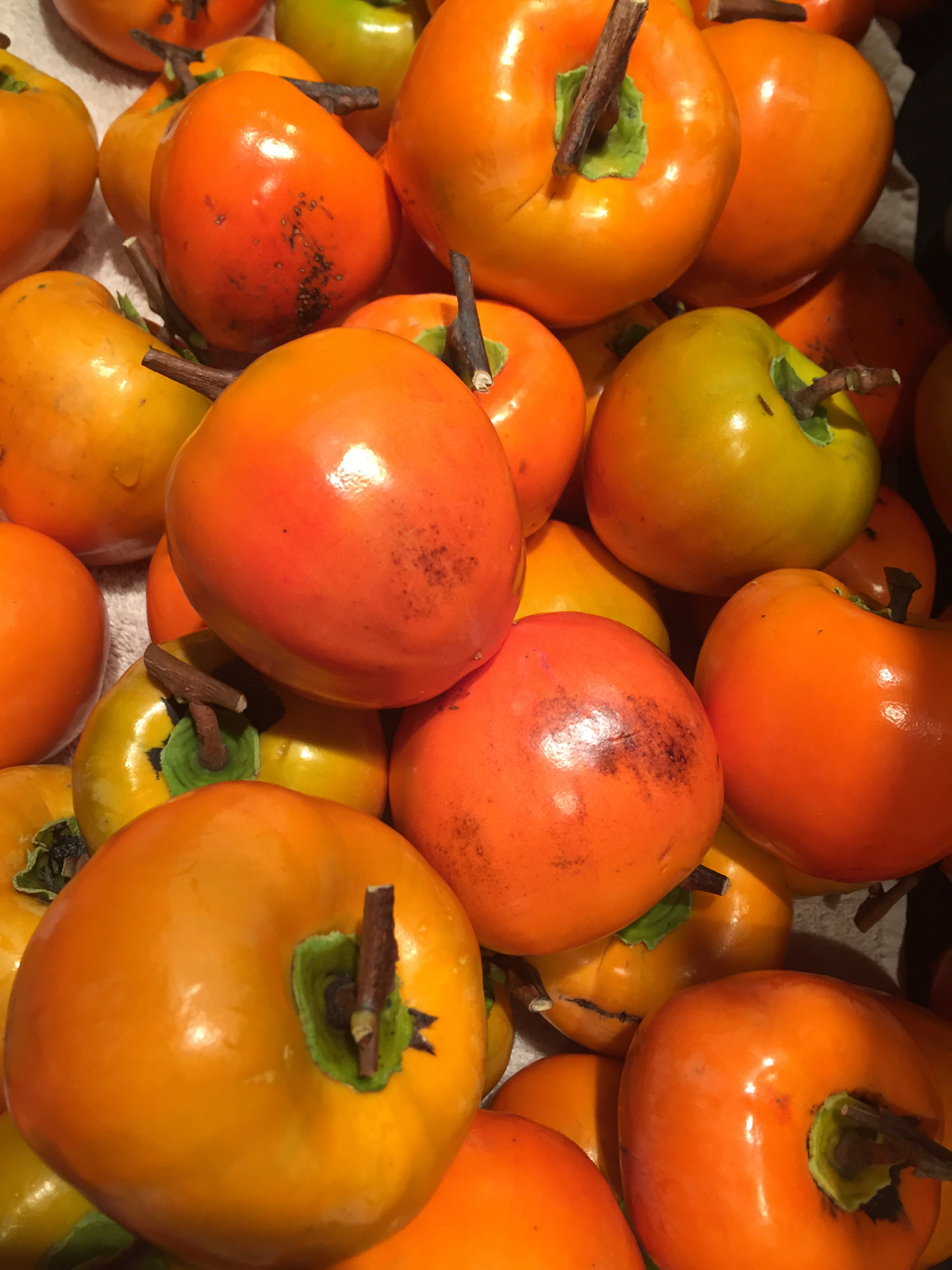 persimmons, washed and trimmed but not peeled